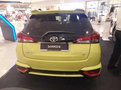 Rear view with distinctive taillights and rear wiper of hatchback.