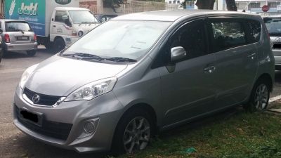 Silver MPV with sleek headlights and multi-spoke alloy wheels