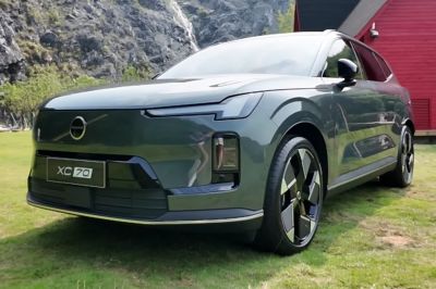 Sleek front design with LED headlights and unique grille.