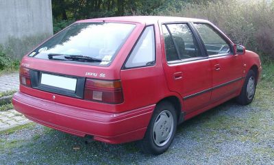 Red 1989 hatchback car rear and side view