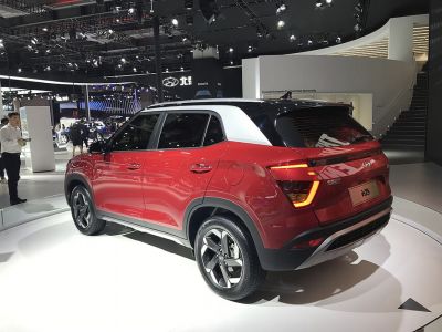 Red SUV rear side with LED tail lights and two-tone roof