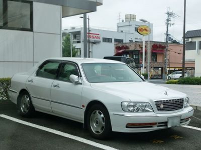 Front grille and side profile of a luxury sedan