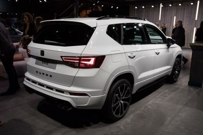 Rear and side view of a white SUV with LED tail lights and sporty alloy wheels