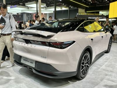 Rear view of a modern vehicle with spoiler and sharp tail lights