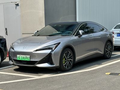 Electric sedan with aerodynamic design and distinctive LED headlights