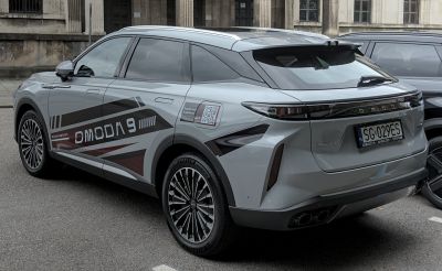 Rear-side view of SUV with sleek taillights and dynamic side graphics
