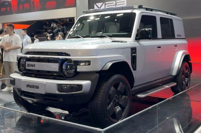 Bold SUV with round headlights and rugged wheel arches