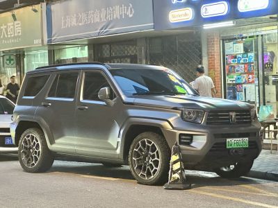 Rugged boxy SUV with distinctive LED headlights and unique alloy wheels