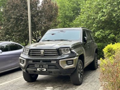 Rugged front grill and bold headlight design on an SUV