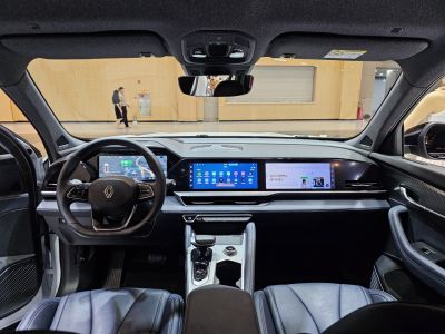 Digital dashboard with dual large touchscreens and premium leather interior