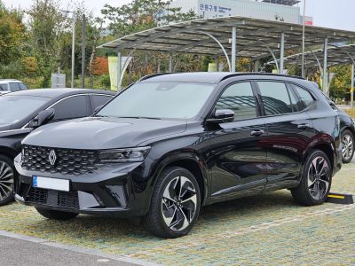 Sleek black SUV with LED headlights and geometric alloy wheels