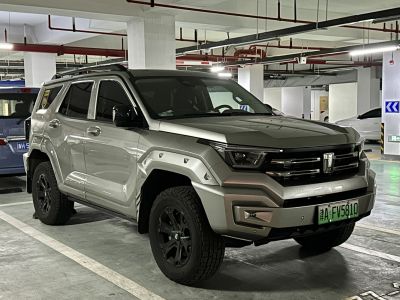 Rugged SUV with off-road tires and angular body design