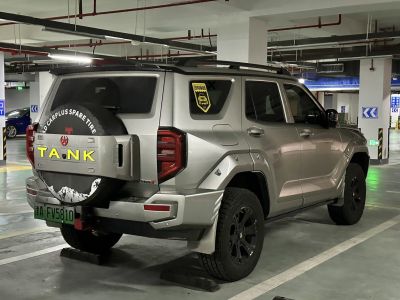 Rear side of SUV with rear spare tire and rugged styling