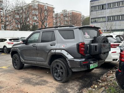 Rugged SUV with rear-mounted spare tire and armored rear design