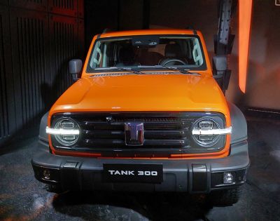 Front view with round headlights and rugged grille