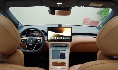 Modern car interior with large touchscreen and digital instrument cluster