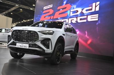 White SUV with bold black hexagonal grille and aggressive design