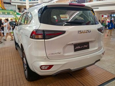 Rear view of SUV featuring sleek taillights and distinct rear design