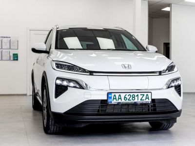 Front view of electric SUV with LED headlights and license plate