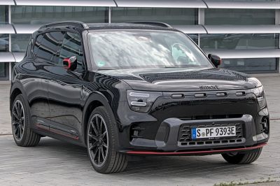 Electric SUV front and side view with modern lighting and aerodynamic shape