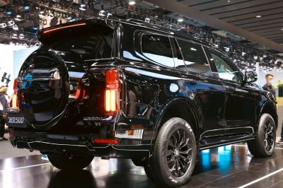 SUV rear with spare tire cover and vertical LED taillights