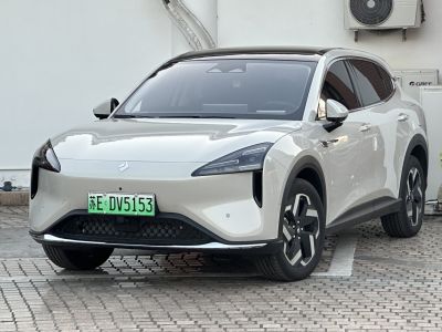 Sleek front fascia and aerodynamic side profile with modern headlights and alloy wheels