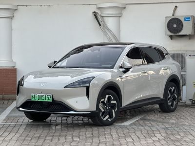 Sleek modern electric SUV with LED headlights and aerodynamic body.