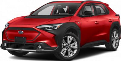 Red SUV with LED headlights and black cladding on front and wheel arches