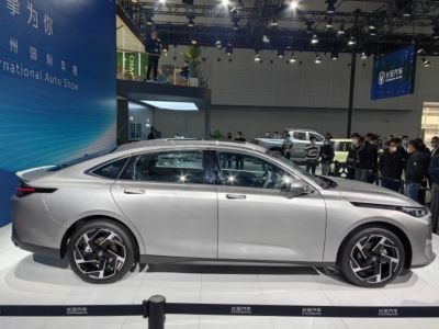 Sleek sedan side profile with modern alloy wheels