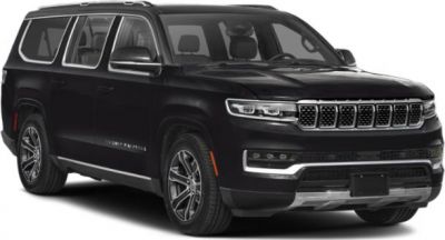 Front side view of a luxury SUV with bold grille and LED headlights