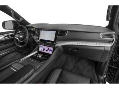 Dual touchscreen infotainment and premium dashboard layout