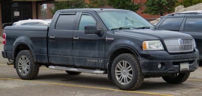 Facelift pickup truck with bold grille and off-road tires