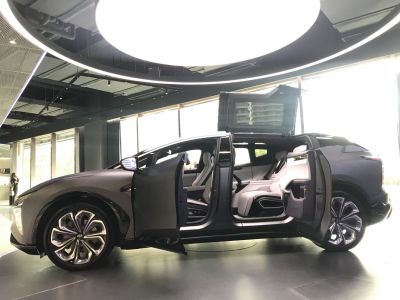 Electric SUV with unique gull-wing rear doors and spacious interior