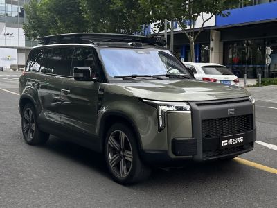 Modern boxy SUV design with roof rack and LED lights