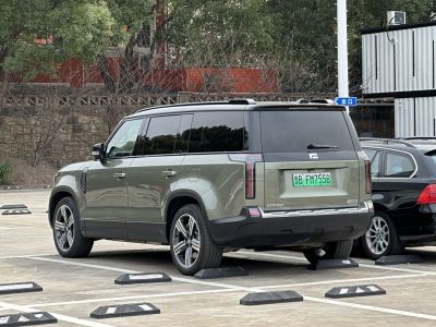 Rear side view of SUV showing taillights and wheels