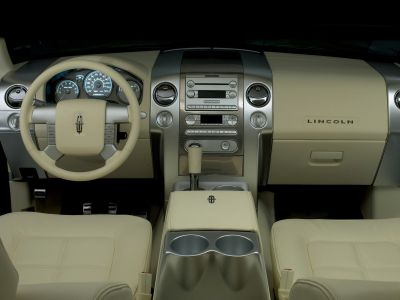 Beige leather interior with detailed dashboard and center console