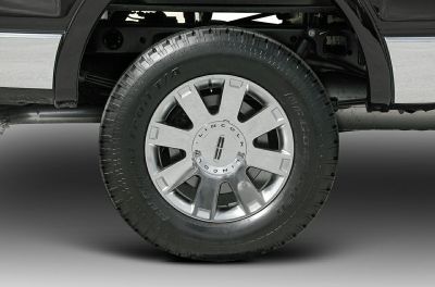 Close-up of alloy wheel and rugged tire with visible brand