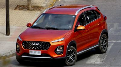 Front and side view of a compact SUV with LED lights and alloy wheels