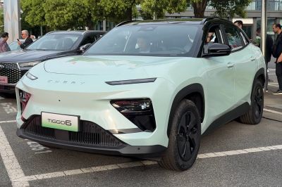 Front and side view of a modern SUV with slim LED lights and black alloy wheels