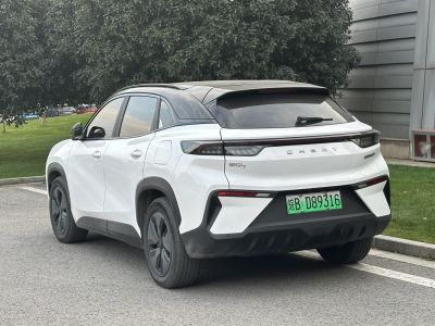 Rear and side view of a modern electric SUV with aerodynamic styling