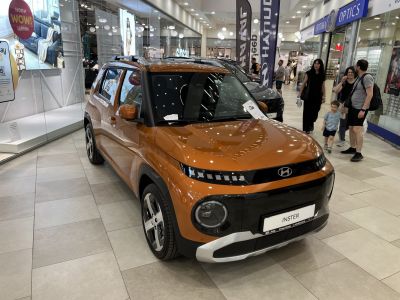 Compact urban SUV with distinctive front grille and round headlights