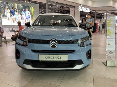 Front view of a compact hatchback with modern grille and headlights