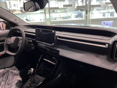 Modern dashboard with touchscreen and manual gear shift