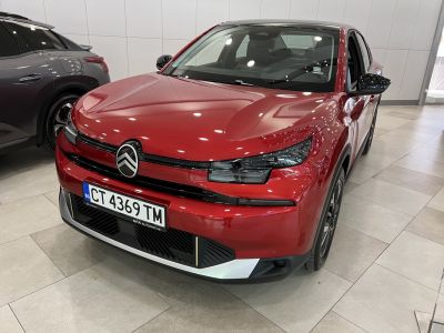 Front fascia with sleek headlights and bold grille