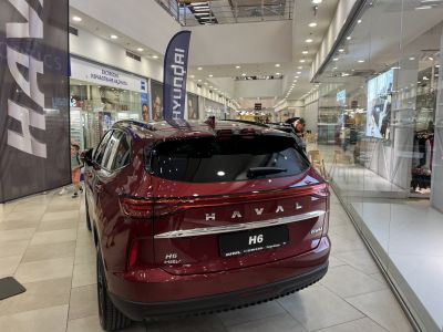 Rear view of SUV with LED taillights and hybrid badge