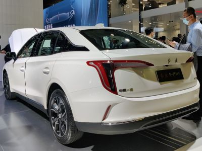 Rear and side view of sleek sedan with modern distinctive taillights