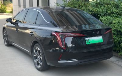 Rear profile with vertical LED tail lights and sleek sedan design