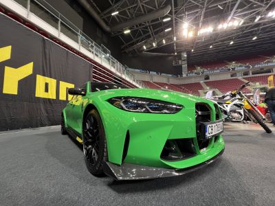 Aggressive front fascia with LED headlights and carbon fiber splitter