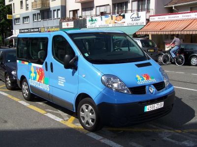 Blue van with Distirbus logo and multiple doors