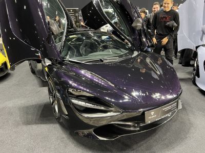 Butterfly doors and aerodynamic hood with sleek black finish